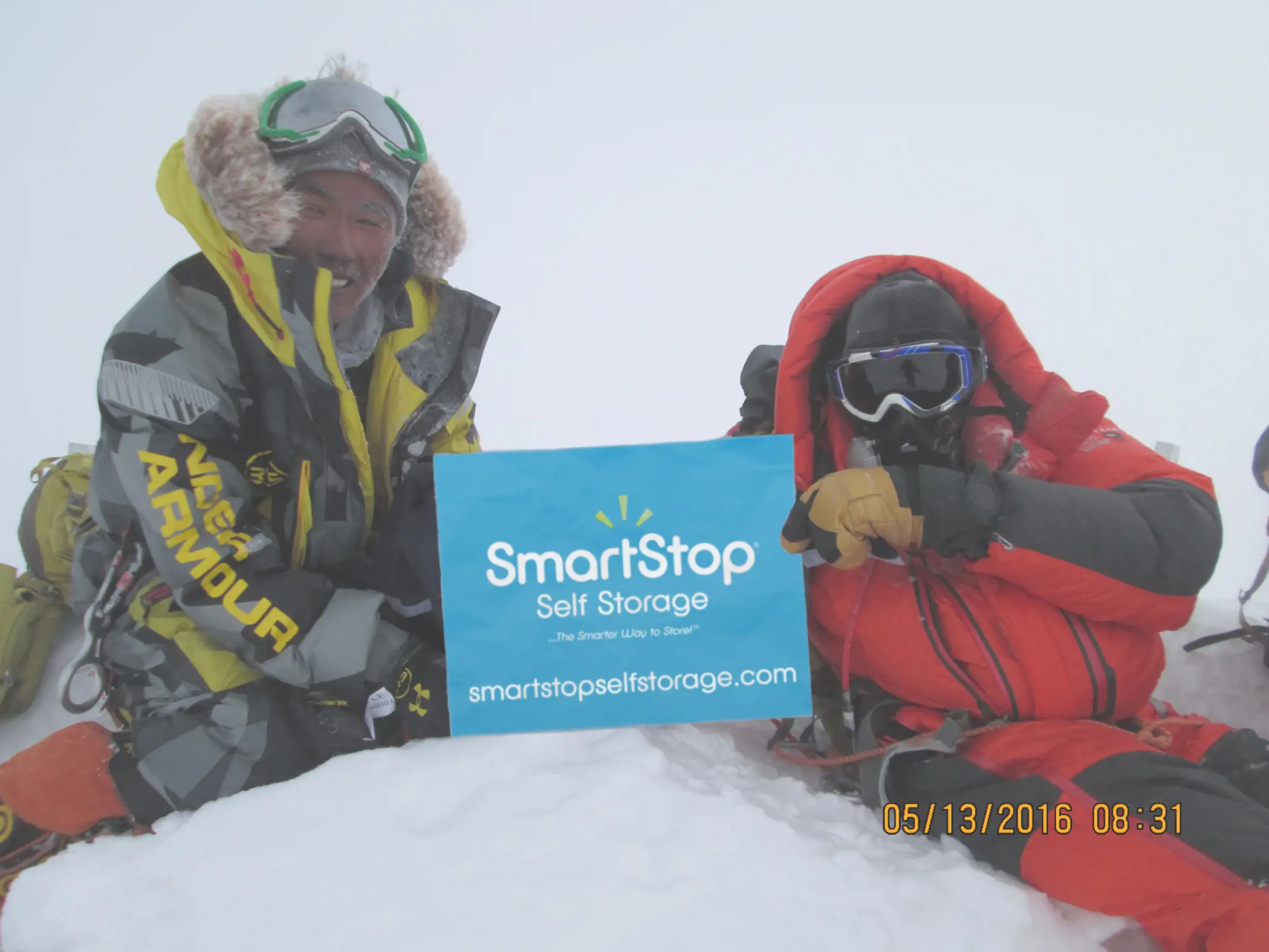 Image of Greg Paul at the summit of Mt. Everest