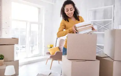 Image of college aged student packing up items to go to storage | SmartStop