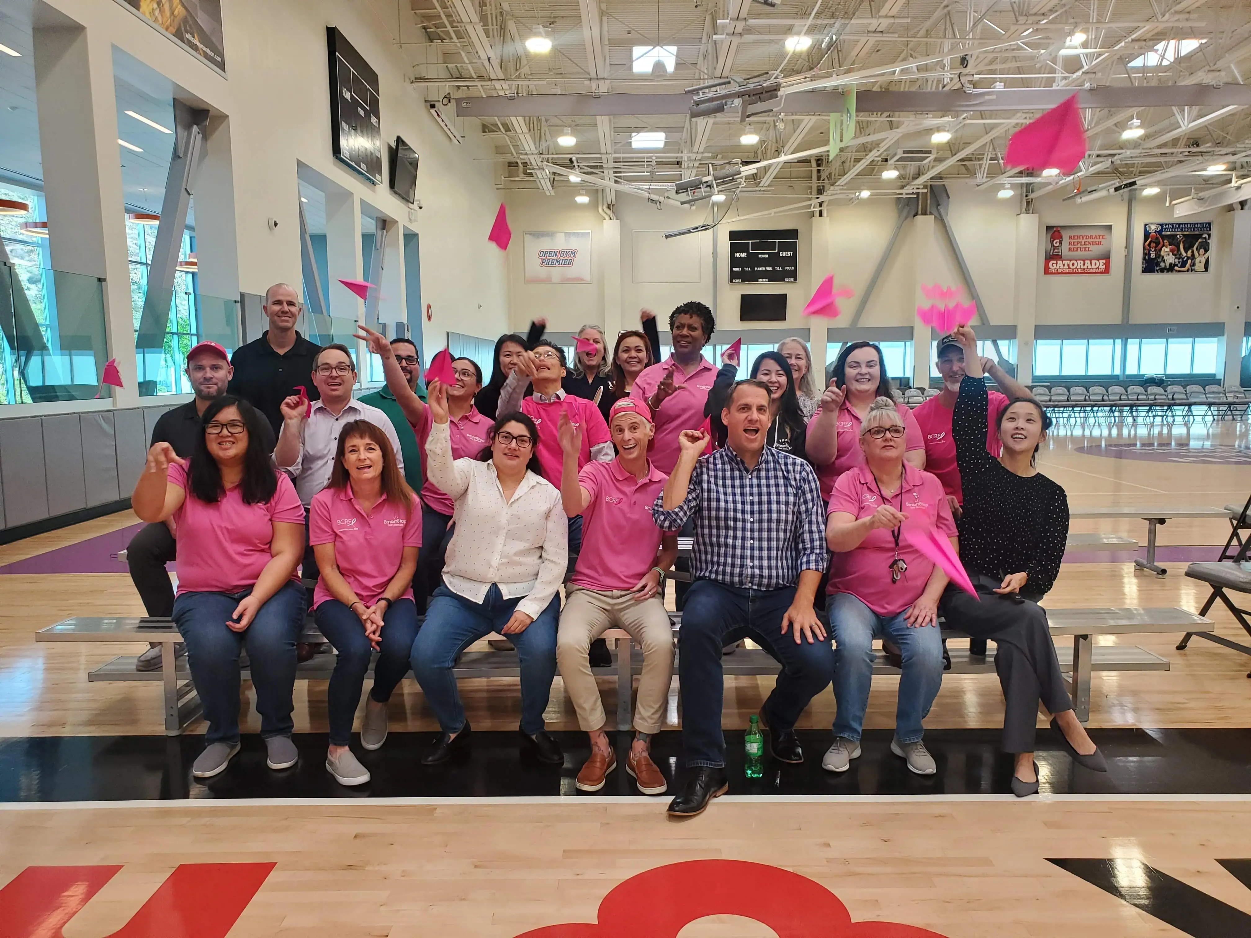 Group of SmartStop employees celebrating the fund raising efforts for the Breast Cancer Research Foundation